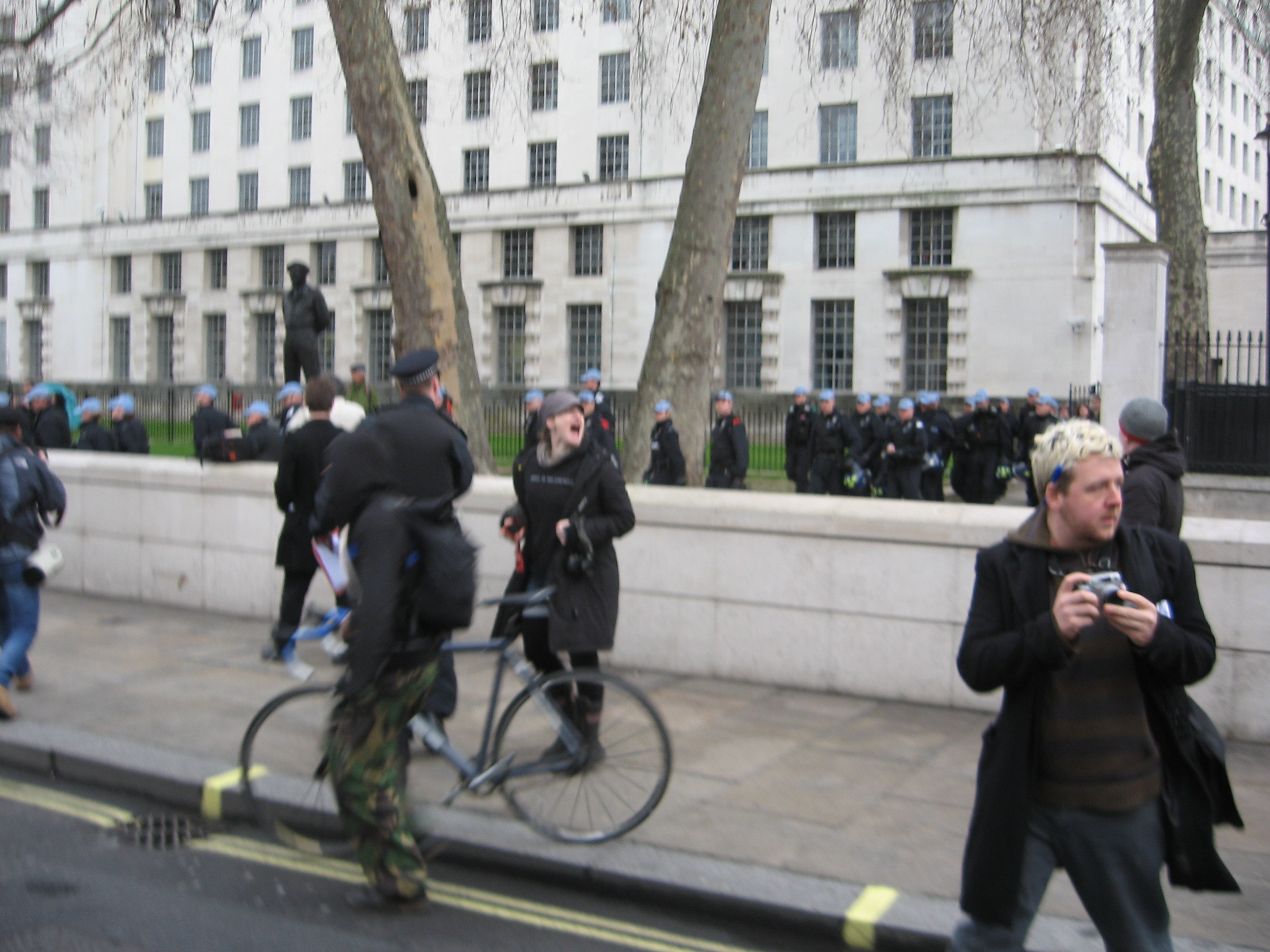 Riot police reveal themselves